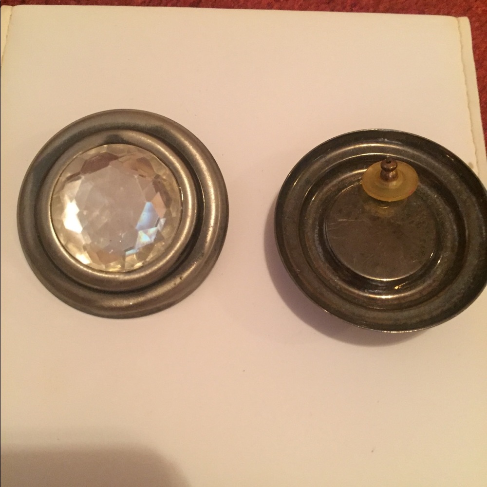 Vintage silver tone earrings with crystal center